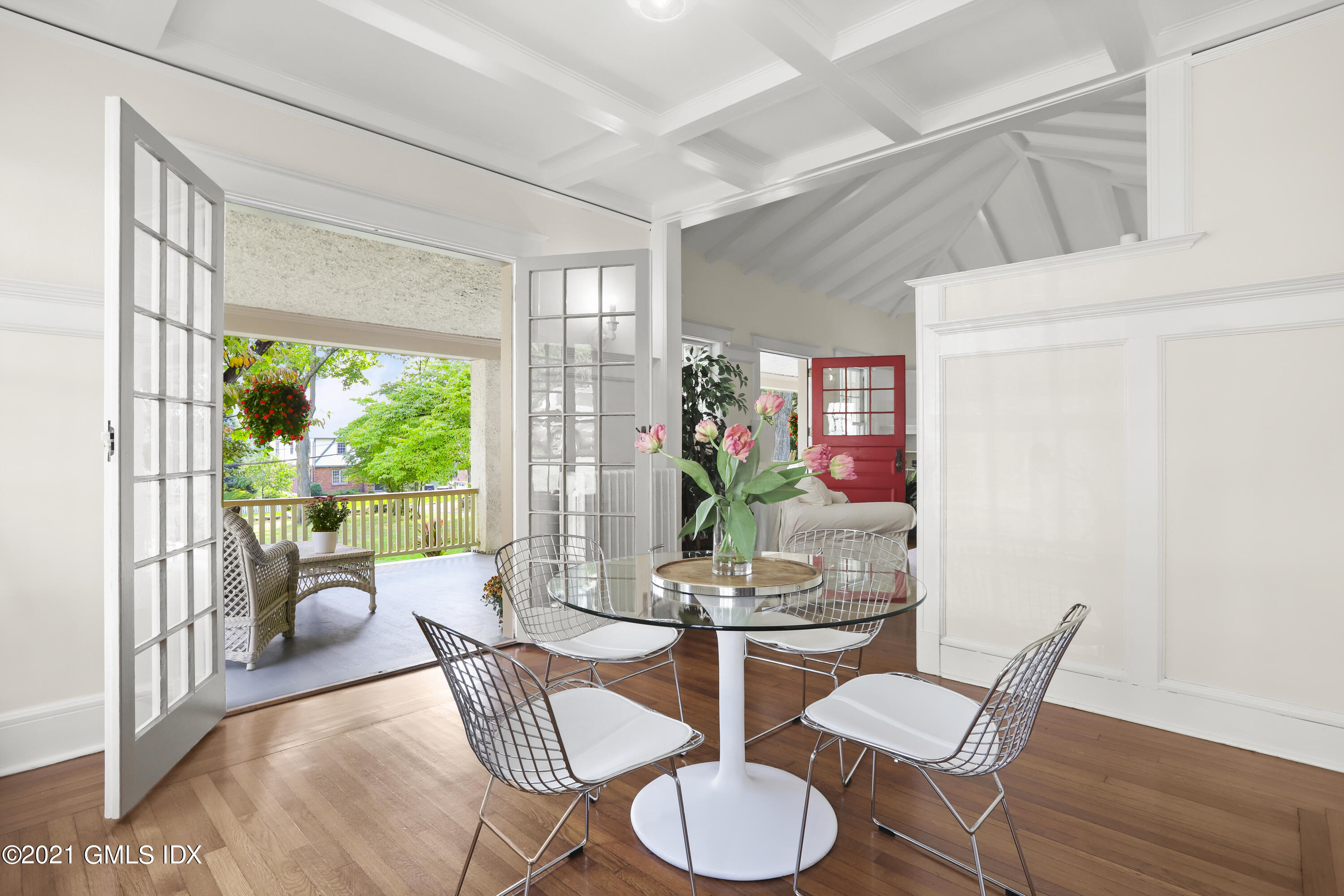 35 Strickland Road Cos Cob, CT 06807 - Photo 10 of 25 a dining room with furniture a livingroom view and wooden floor