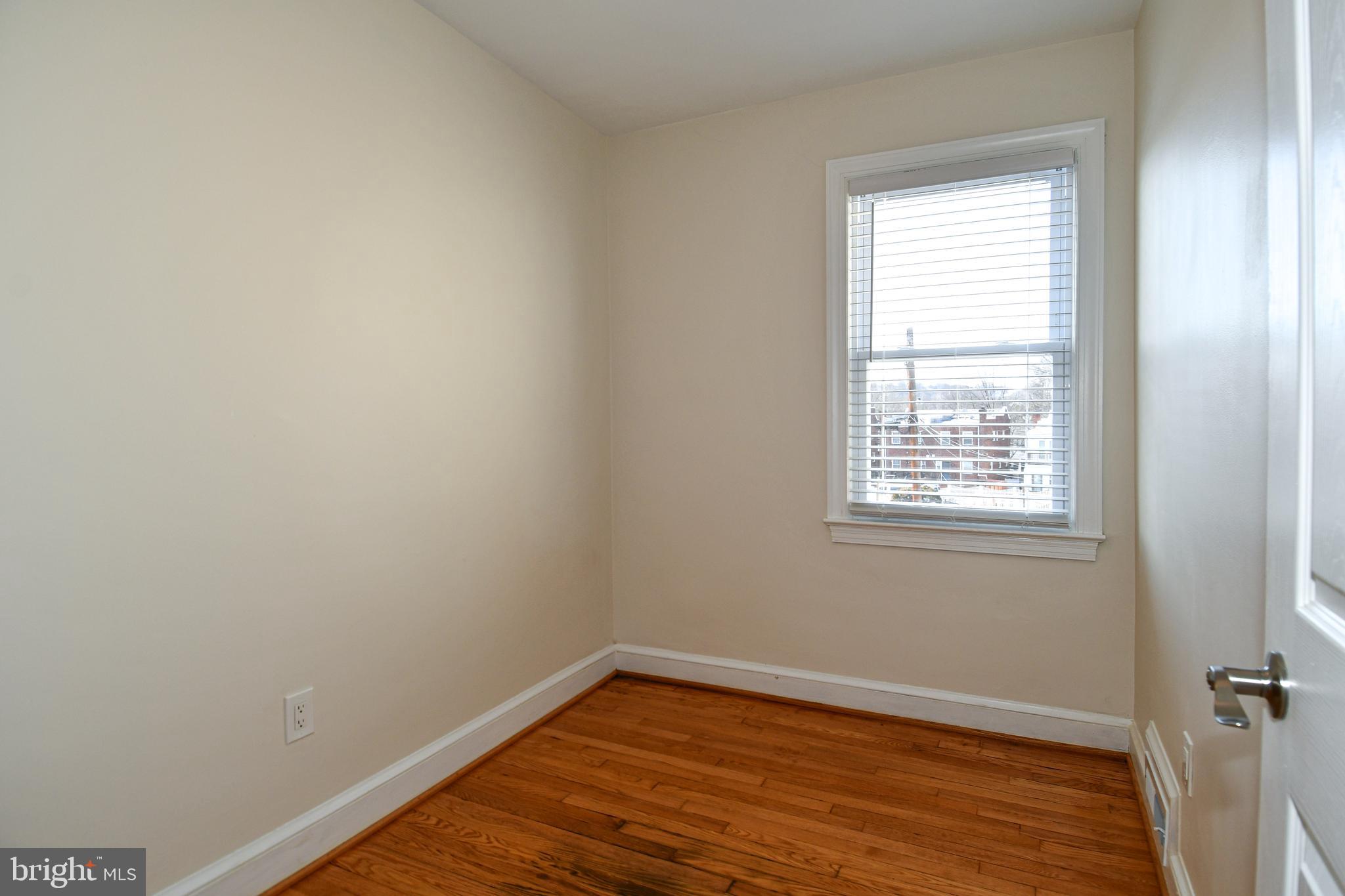 4620 Sargent Road Northeast Washington, DC 20017 - Photo 15 of 34 an empty room with a window
