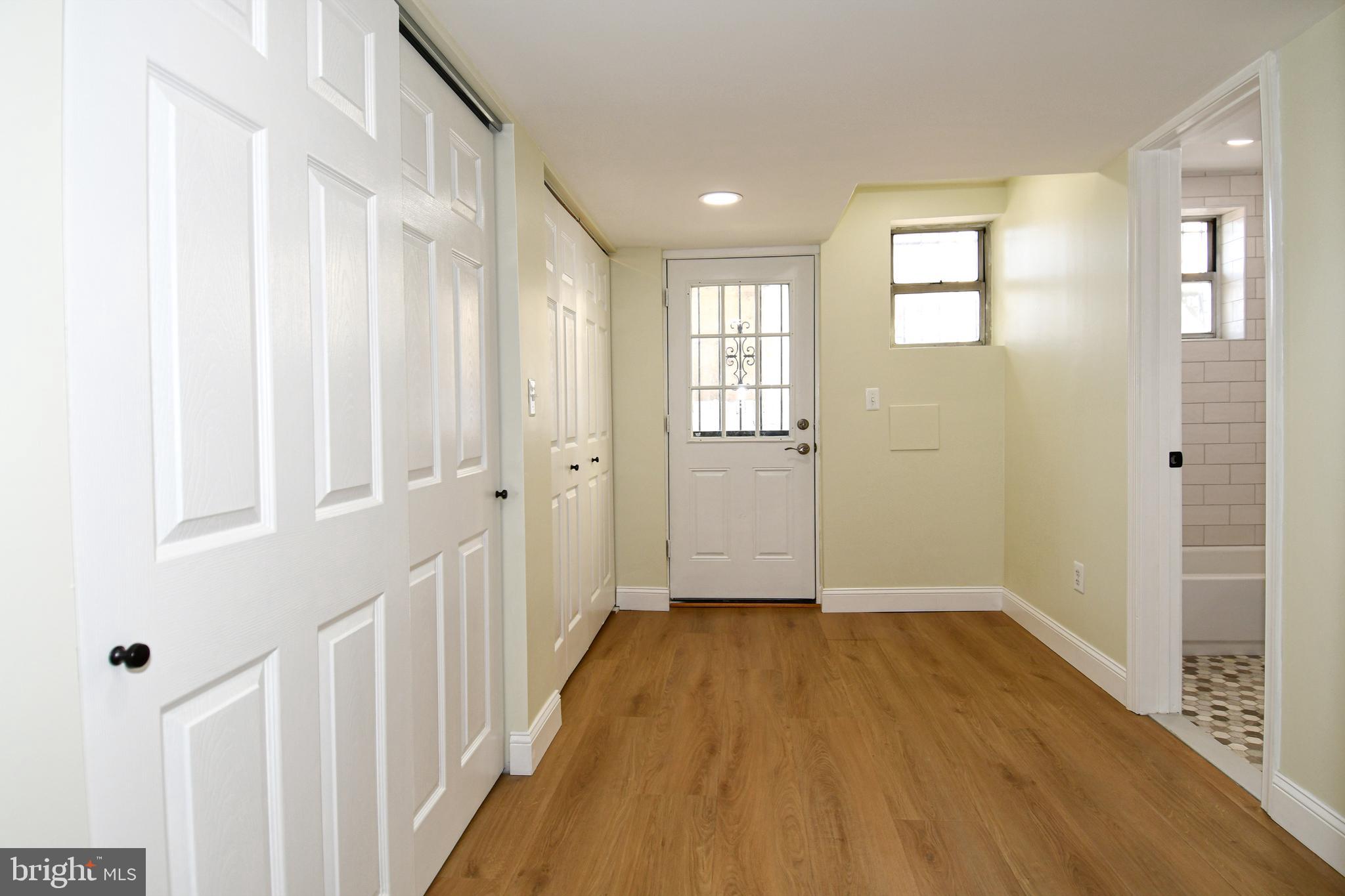 4620 Sargent Road Northeast Washington, DC 20017 - Photo 29 of 34 a view of a hallway with wooden floor and closet area
