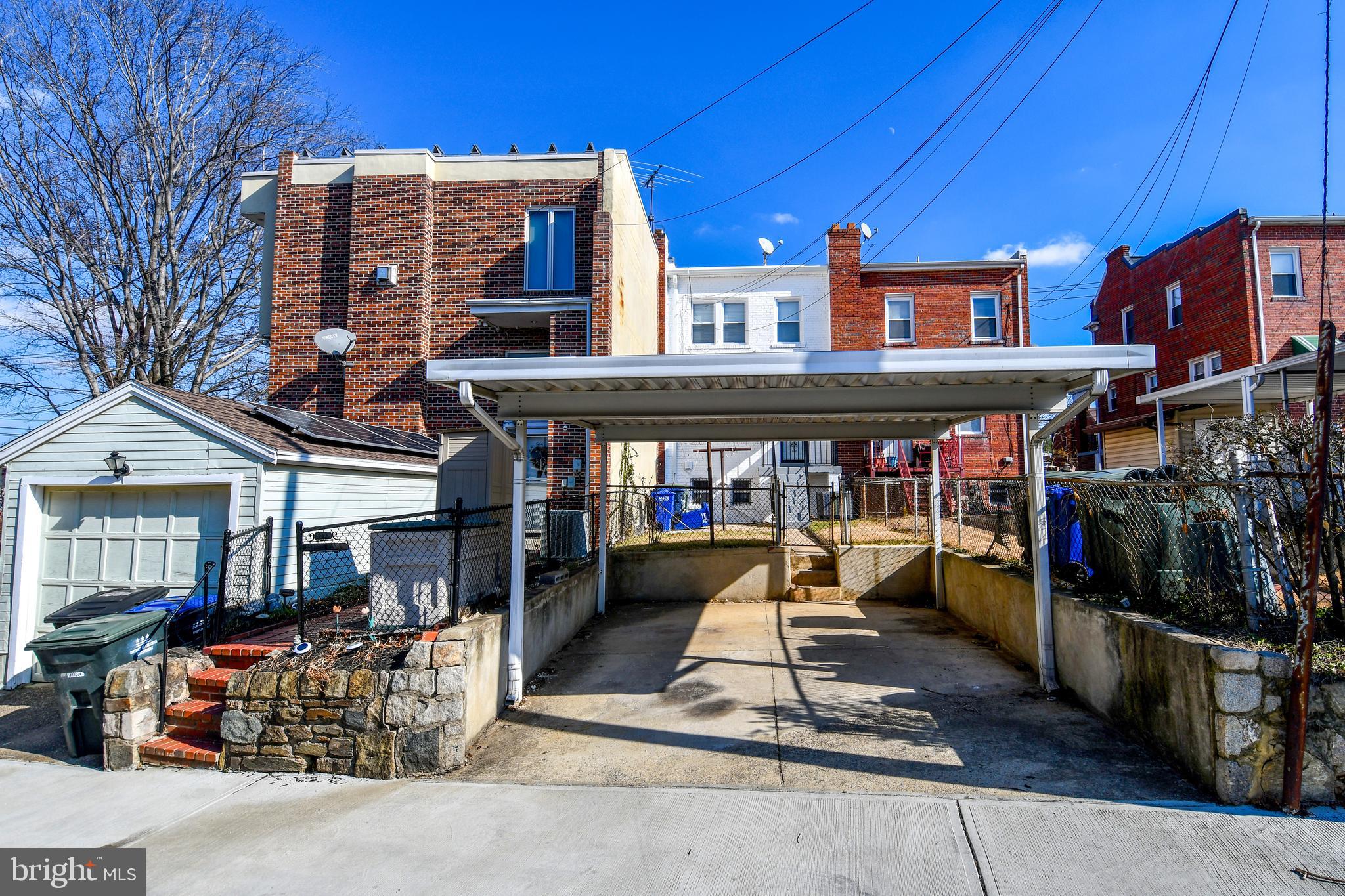 4620 Sargent Road Northeast Washington, DC 20017 - Photo 33 of 34 a front view of a building with sitting area