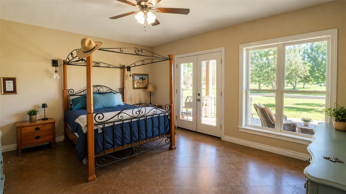11810 Riley Green Road Franklin, TX 77856 - Photo 14 of 36 a bedroom with a bed and a window
