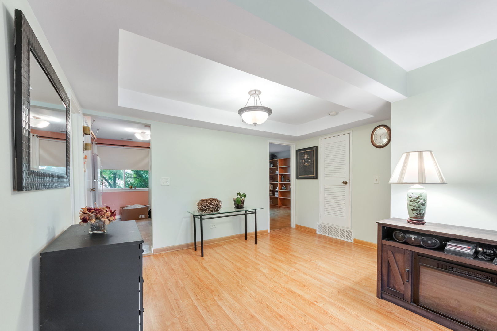 8559 West Rascher Avenue, Unit 3N Chicago, IL 60656 - Photo 7 of 15 a living room with furniture and wooden floor