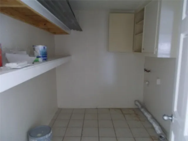 a bathroom with a shower and toilet