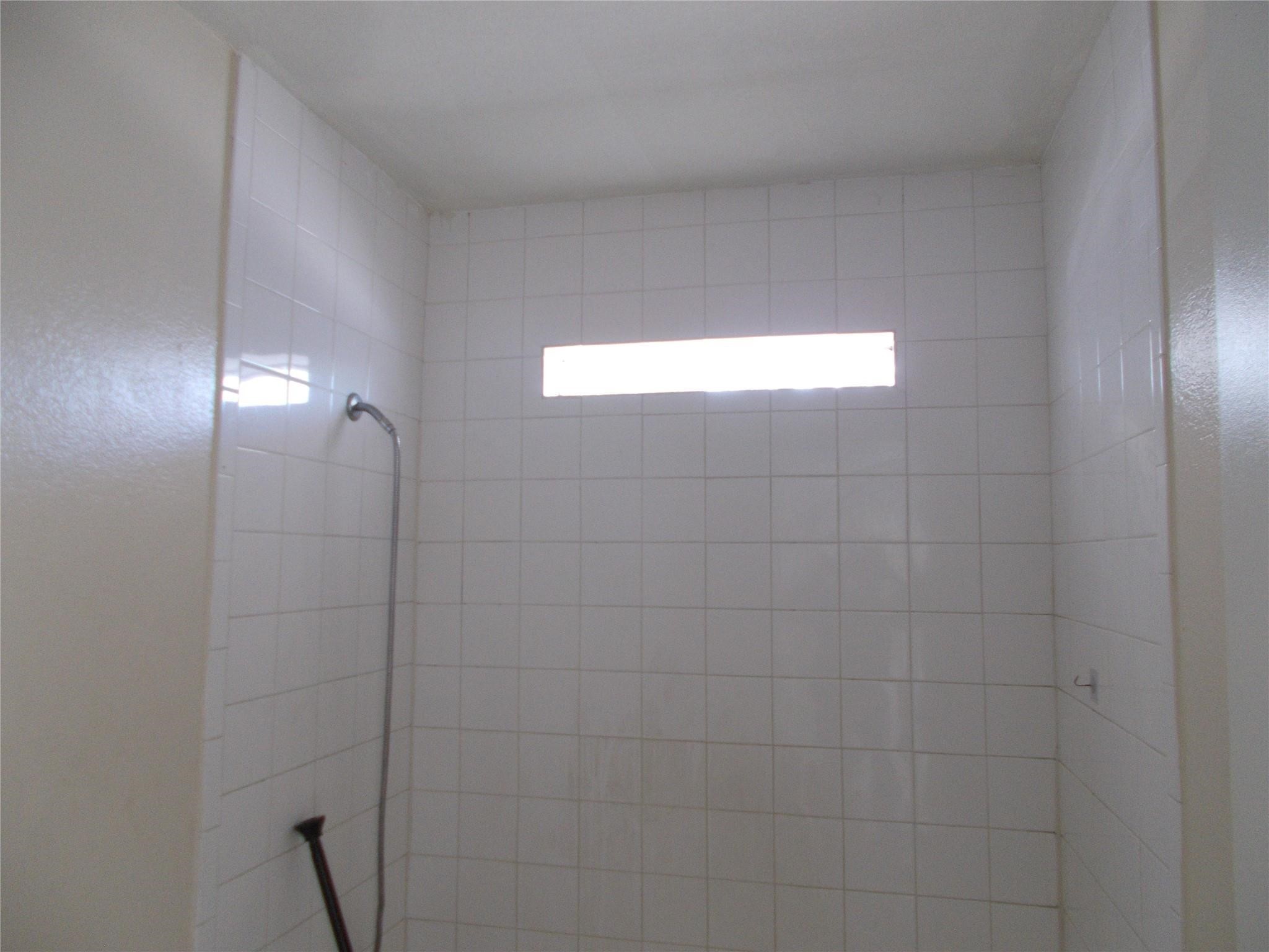 1923 Ojeman Road Houston, TX 77080 - Photo 6 of 14 a bathroom with a shower