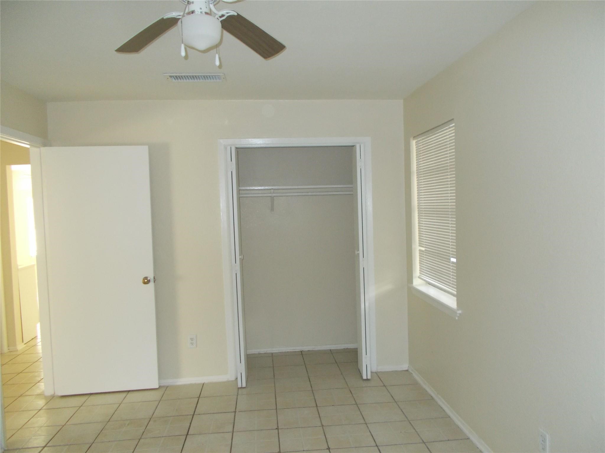 1923 Ojeman Road Houston, TX 77080 - Photo 10 of 14 an empty room with closet