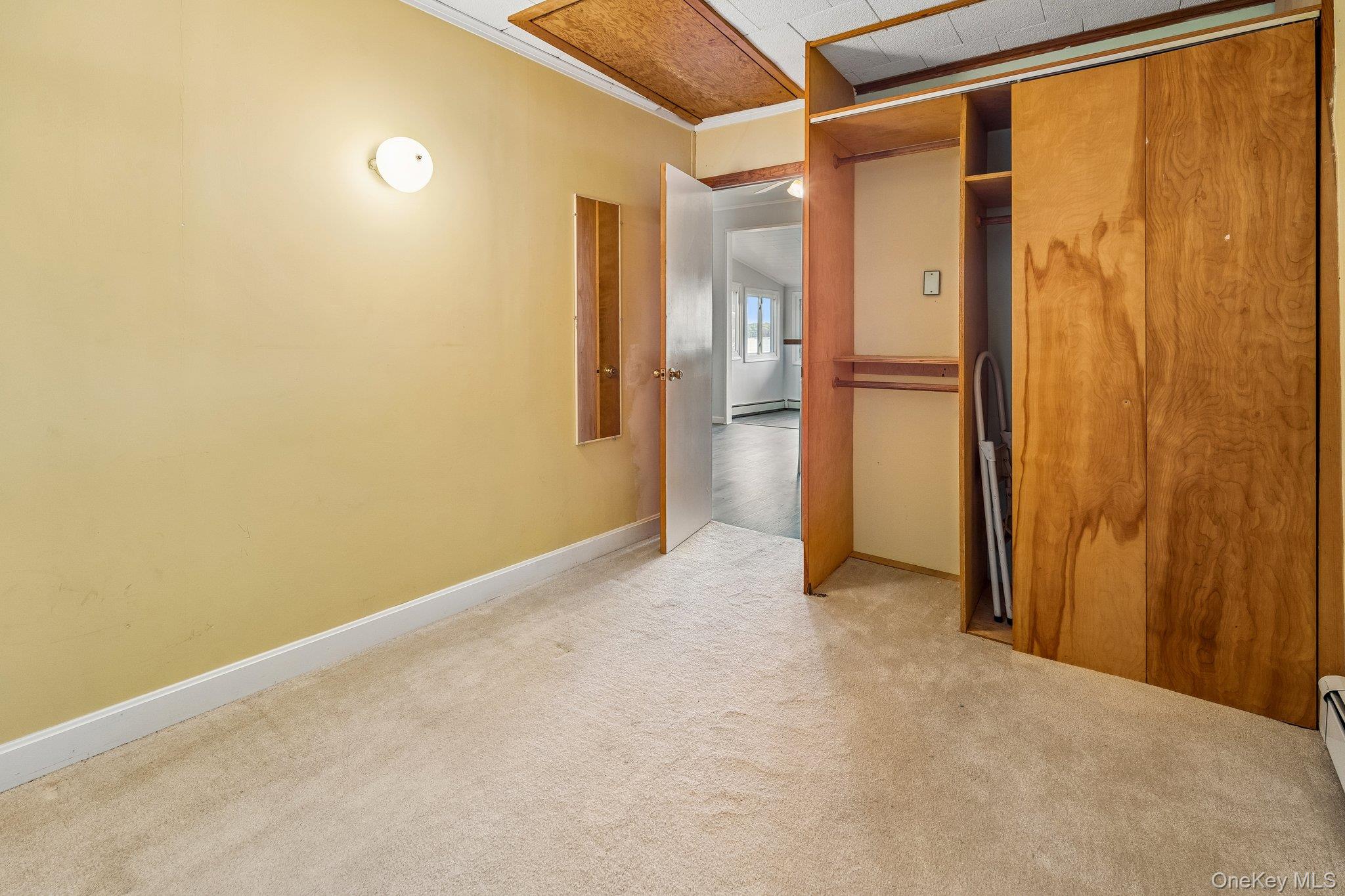75-25 West Shore Road, Unit MAIN ST Port Washington, NY 11050 - Photo 15 of 26 First Bedroom