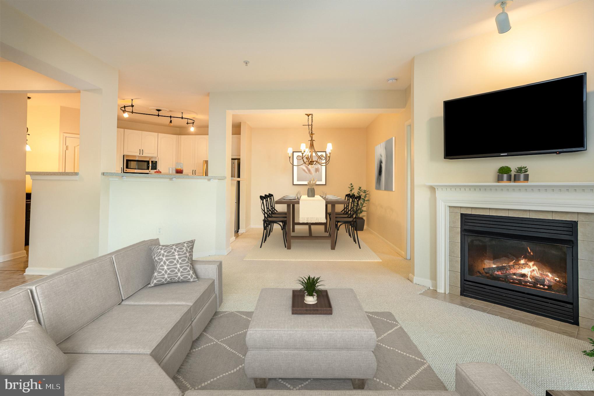 400 Symphony Circle, Unit 350D Cockeysville, MD 21030 - Photo 5 of 24 Living Room with fireplace (staged)