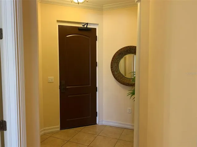 a close view of a utility room with dryer and washer
