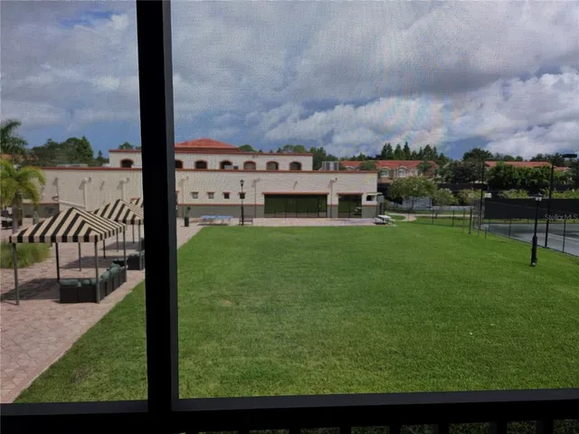 a view of a terrace with yard