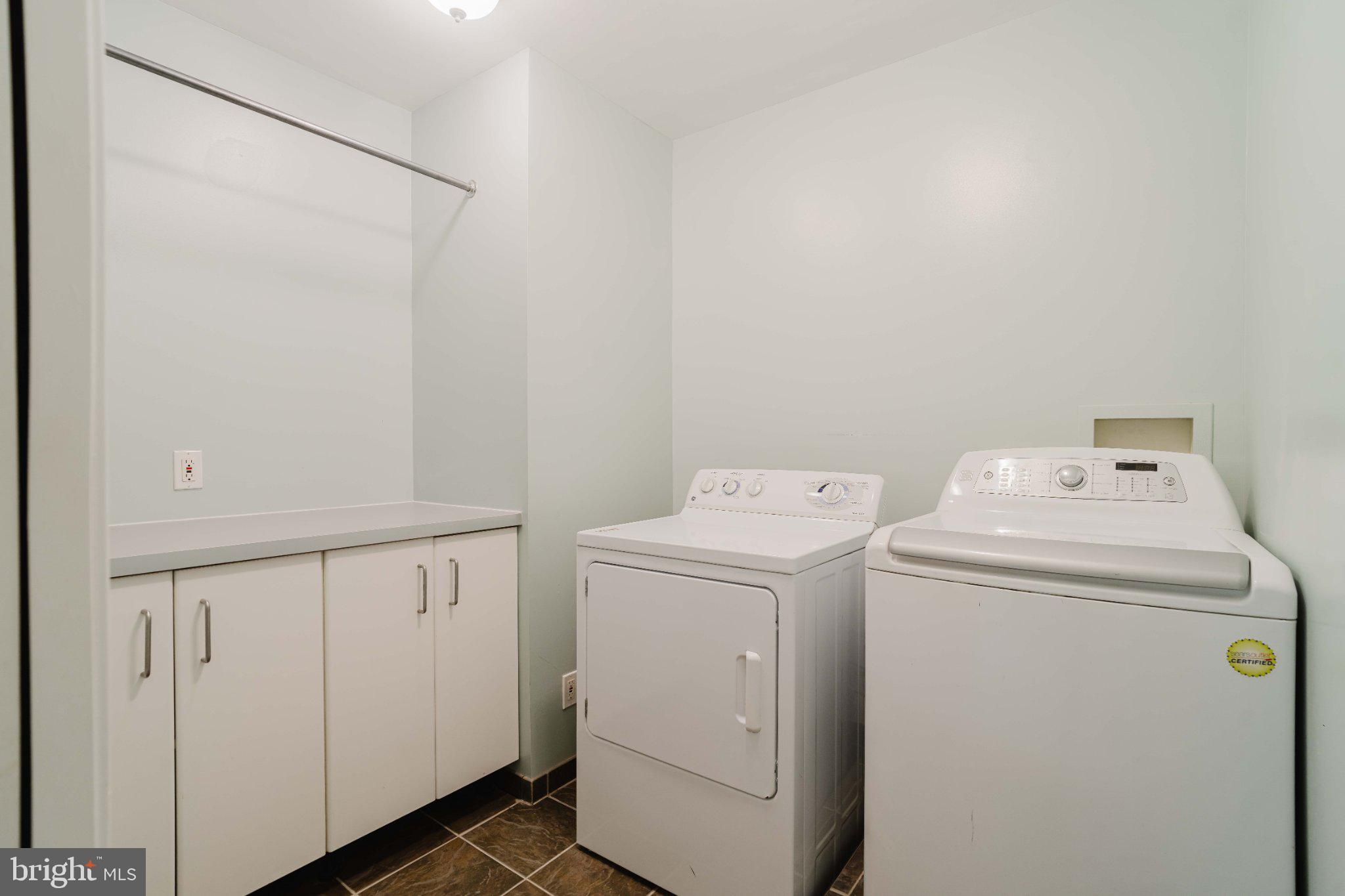 10200 Duvawn Place Silver Spring, MD 20902 - Photo 25 of 42 Bright and functional laundry space.