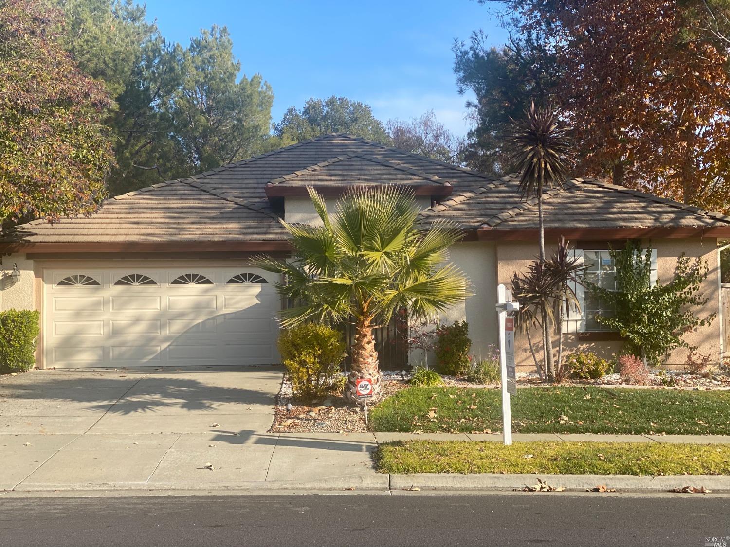 a view of a house with a iron gate
