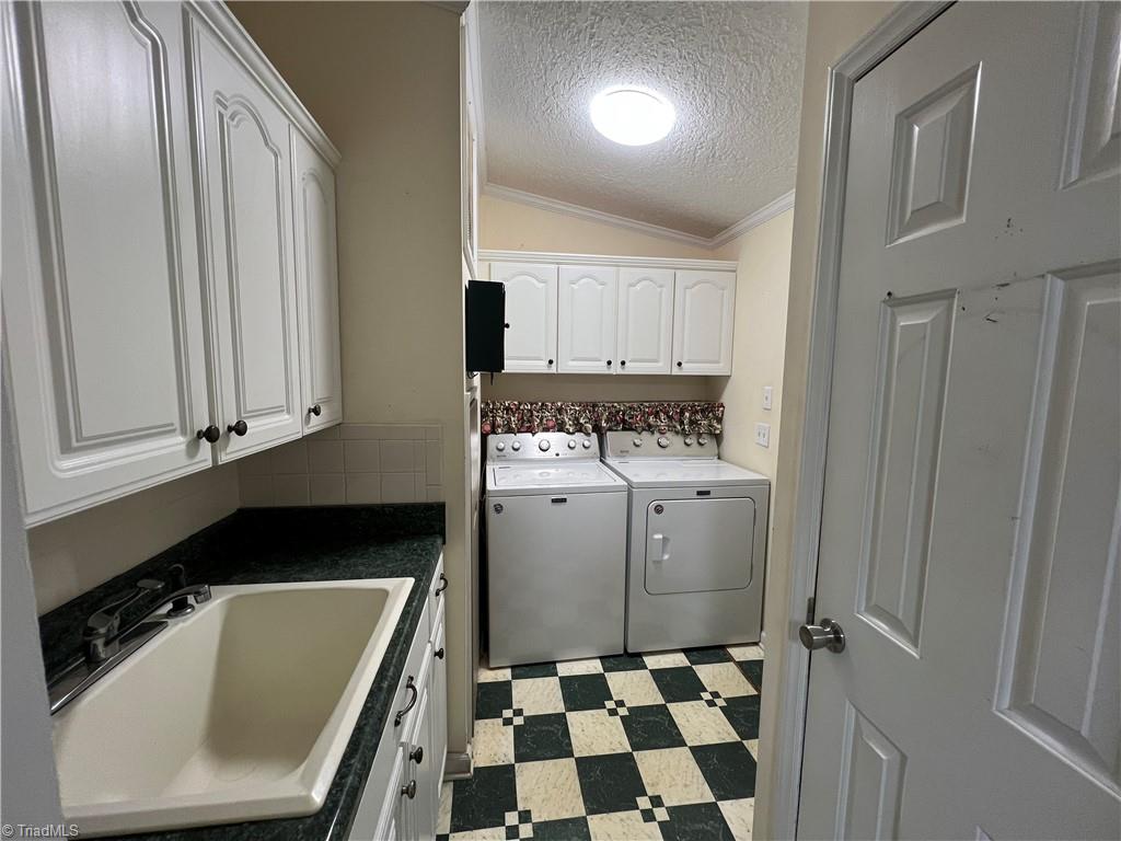 131 Sheraton Court King, NC 27021 - Photo 13 of 35 Laundry Room with utility sink