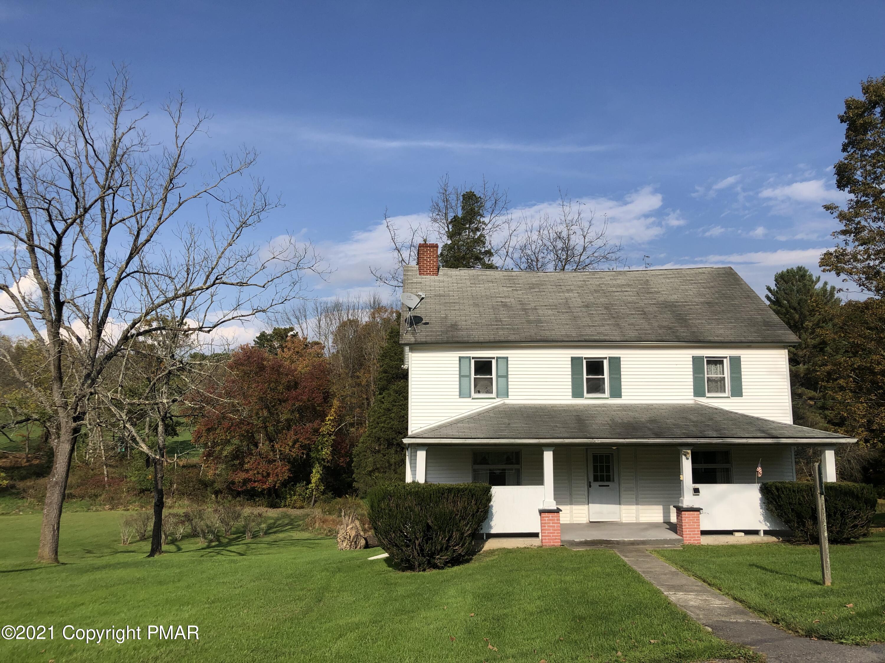 173 Anchorage Road Saylorsburg, PA 18353 - Photo 2 of 56 a view of a yard in front of a house