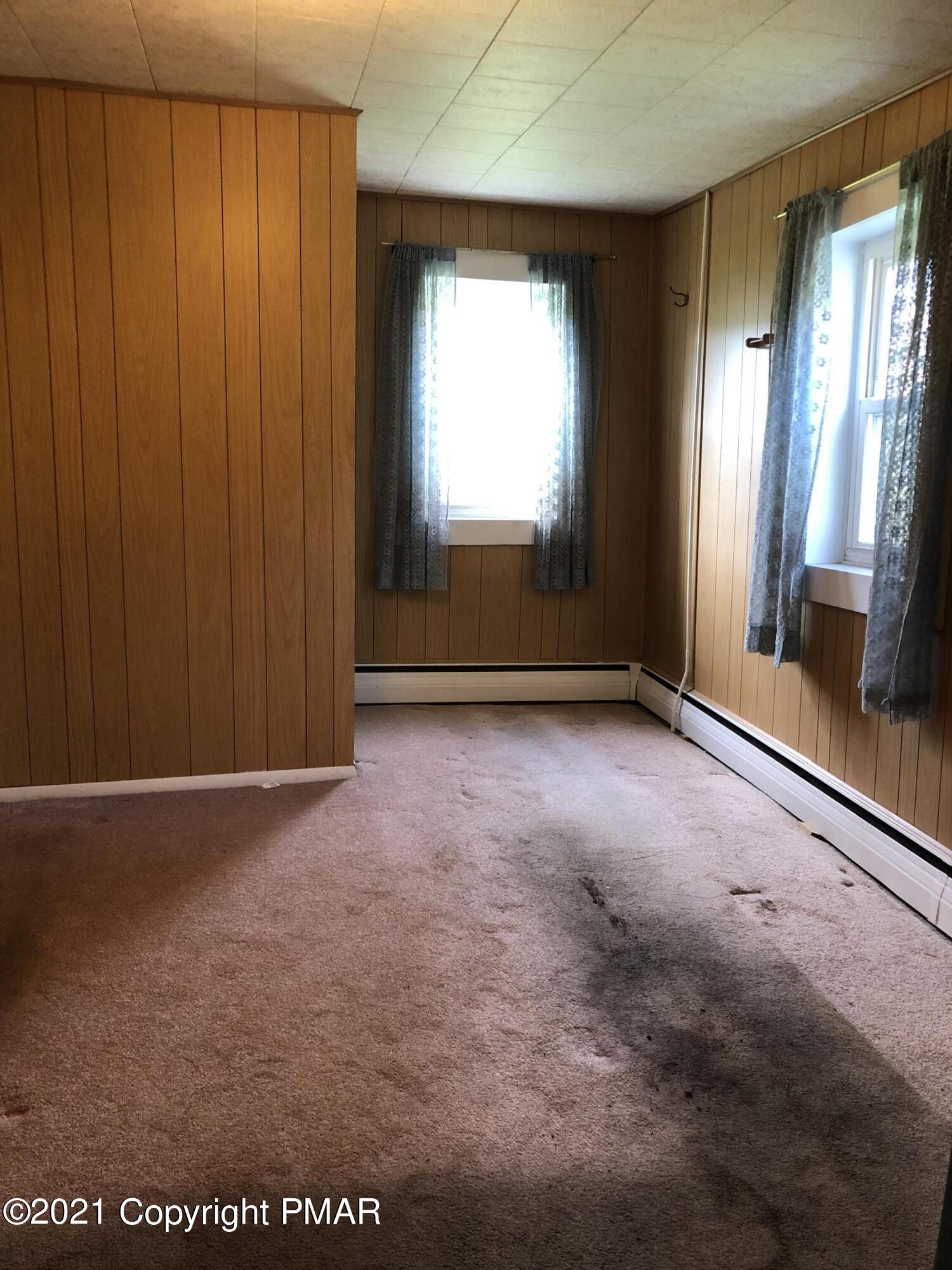 173 Anchorage Road Saylorsburg, PA 18353 - Photo 27 of 56 a view of empty room with a fireplace