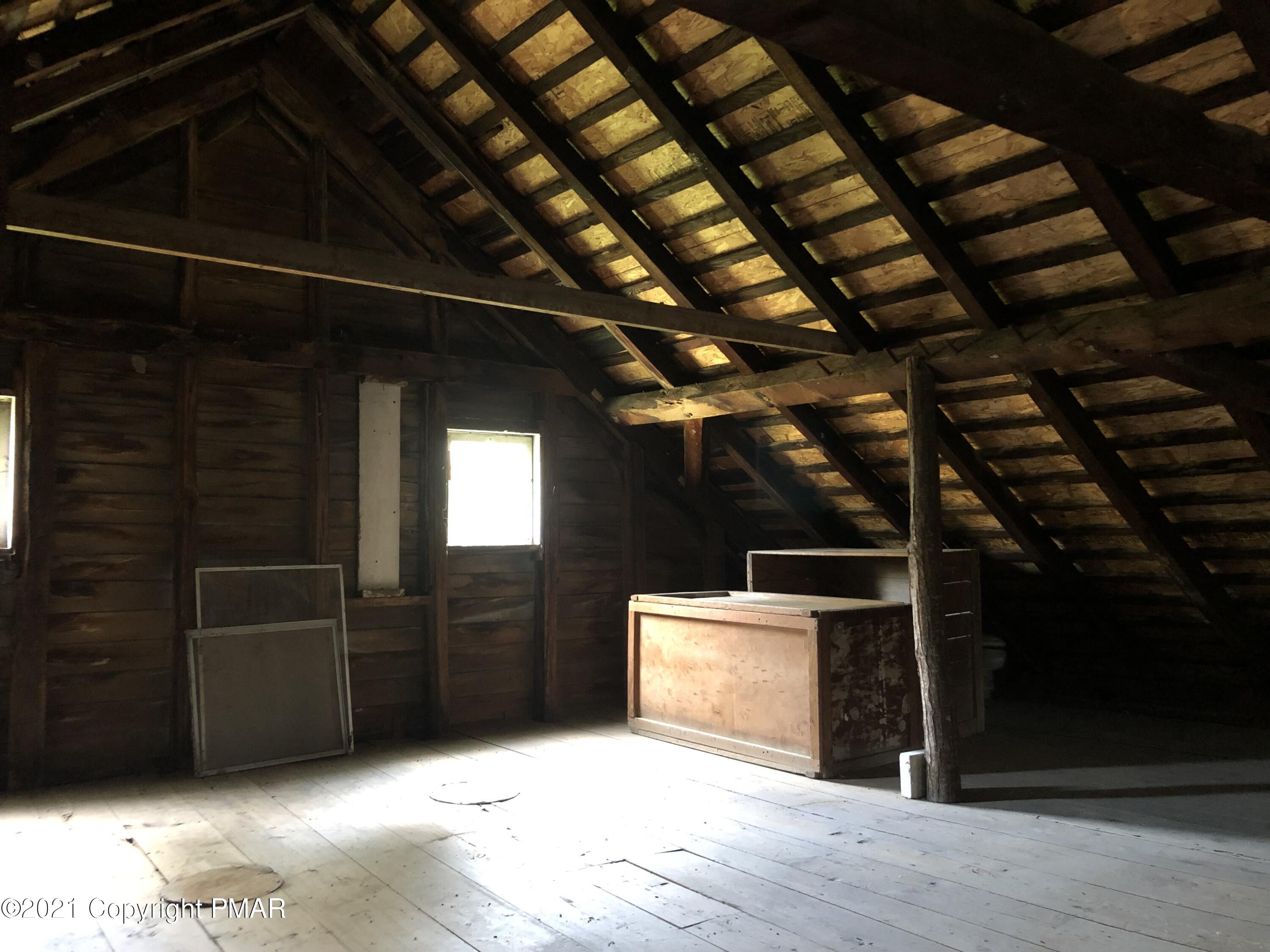 173 Anchorage Road Saylorsburg, PA 18353 - Photo 48 of 56 a view of an empty room with wooden floor