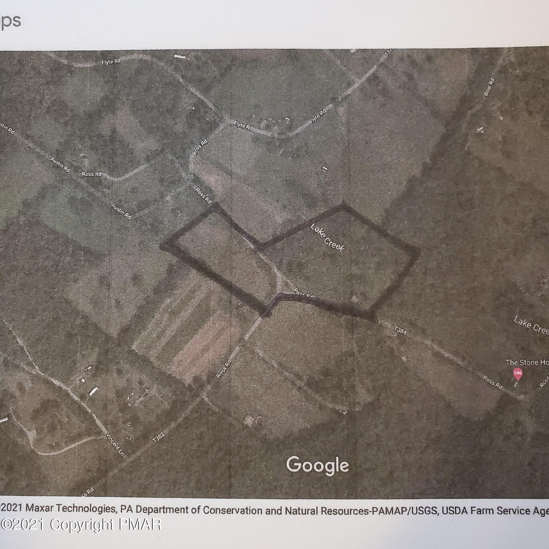 173 Anchorage Road Saylorsburg, PA 18353 - Photo 55 of 56 a black and white photo of a field