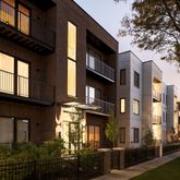 a view of a building with a yard