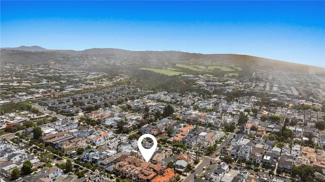 an aerial view of mountain with trees