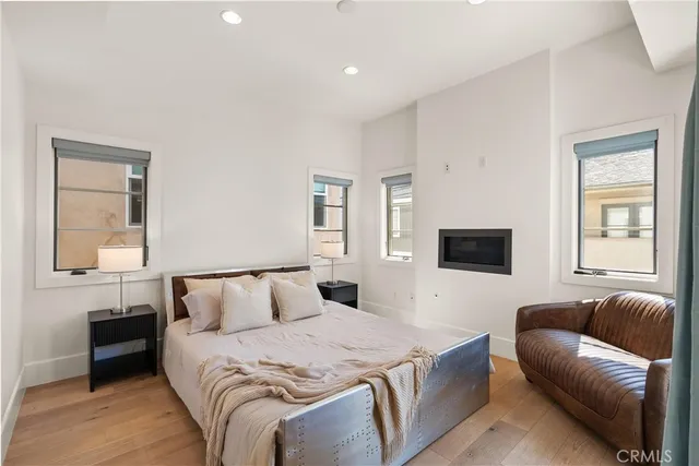 a bedroom with a bed and a couch