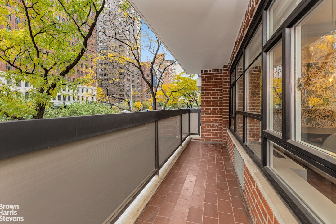 750 Park Avenue, Unit 3B Manhattan, NY 10021 - Photo 11 of 13 a view of balcony with wooden floor