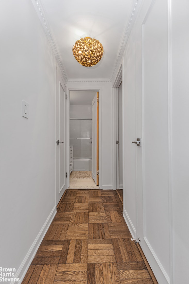 750 Park Avenue, Unit 3B Manhattan, NY 10021 - Photo 9 of 13 a view of a hallway