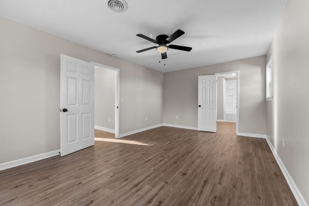 195 Hogsed Road Hiawassee, GA 30546 - Photo 23 of 25 a view of an empty room with wooden floor