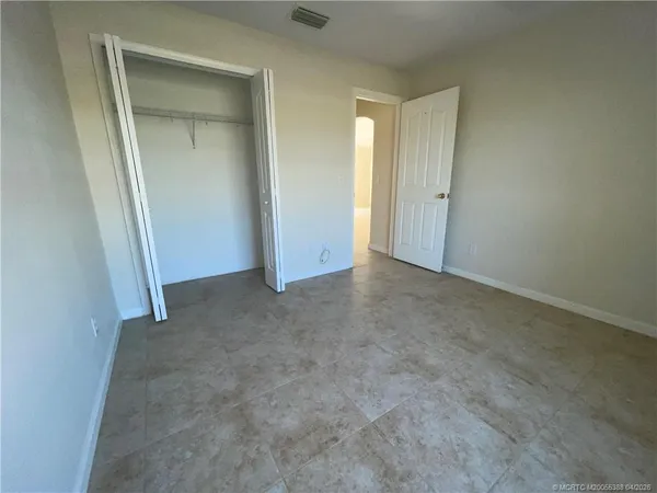 an empty room with closet