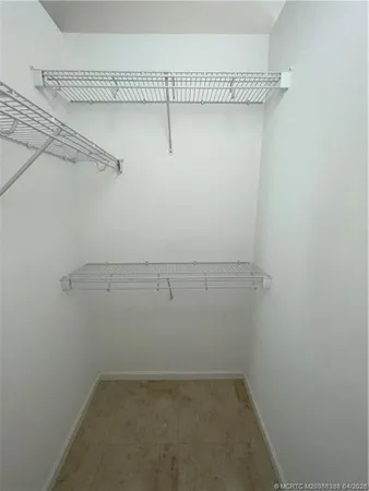 a view of a room with racks on the wall