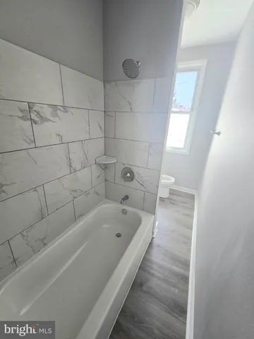 a bathroom with a bathtub