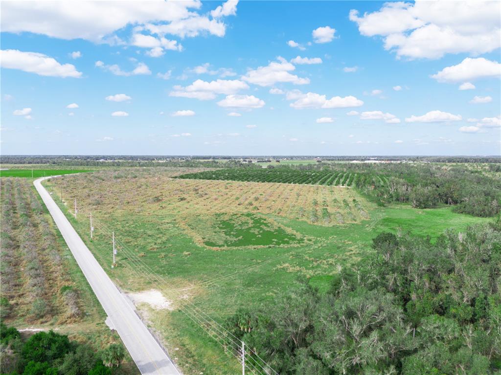 2485 South Florida Avenue Wauchula, FL 33873 - Photo 8 of 18 a view of a lake with a big yard