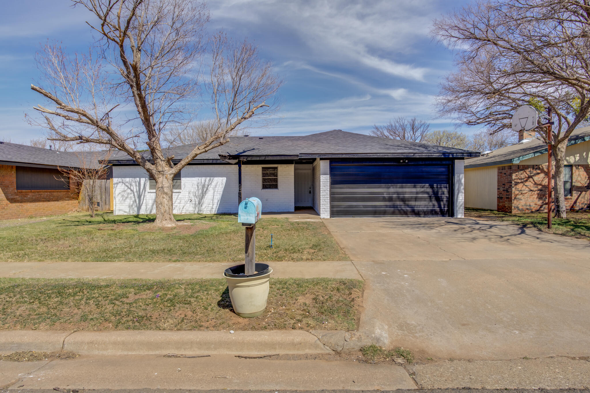 a view of a house with tub and garage
