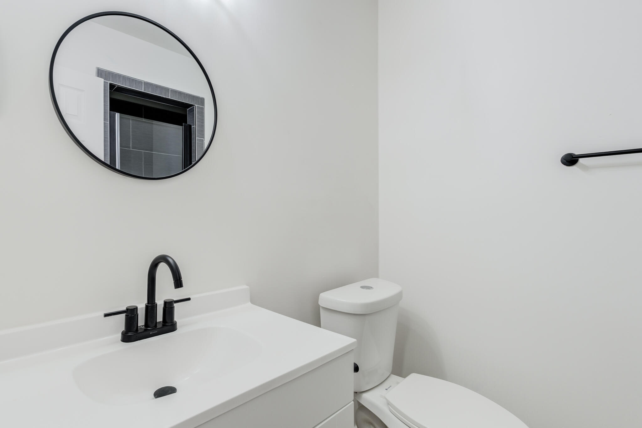 2314 77th Street Lubbock, TX 79423 - Photo 21 of 41 a bathroom with a sink and a mirror