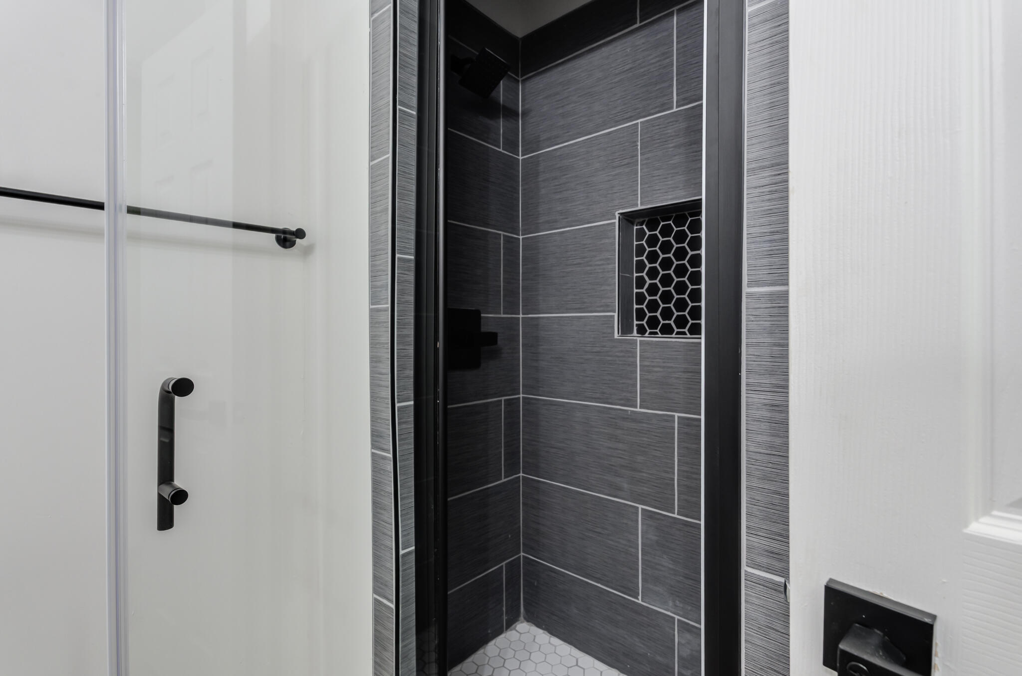 2314 77th Street Lubbock, TX 79423 - Photo 22 of 41 a bathroom with a shower and a sink