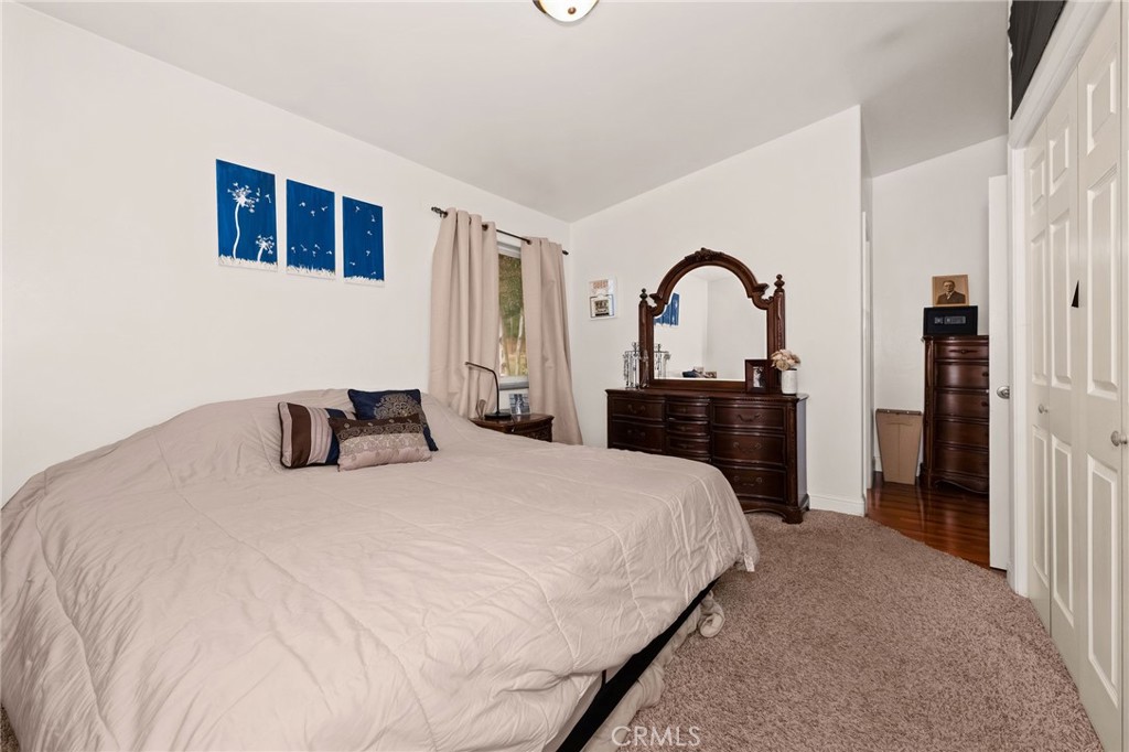 2728 Pentz Road Oroville, CA 95965 - Photo 20 of 52 a bedroom with a bed and a large mirror on the dresser