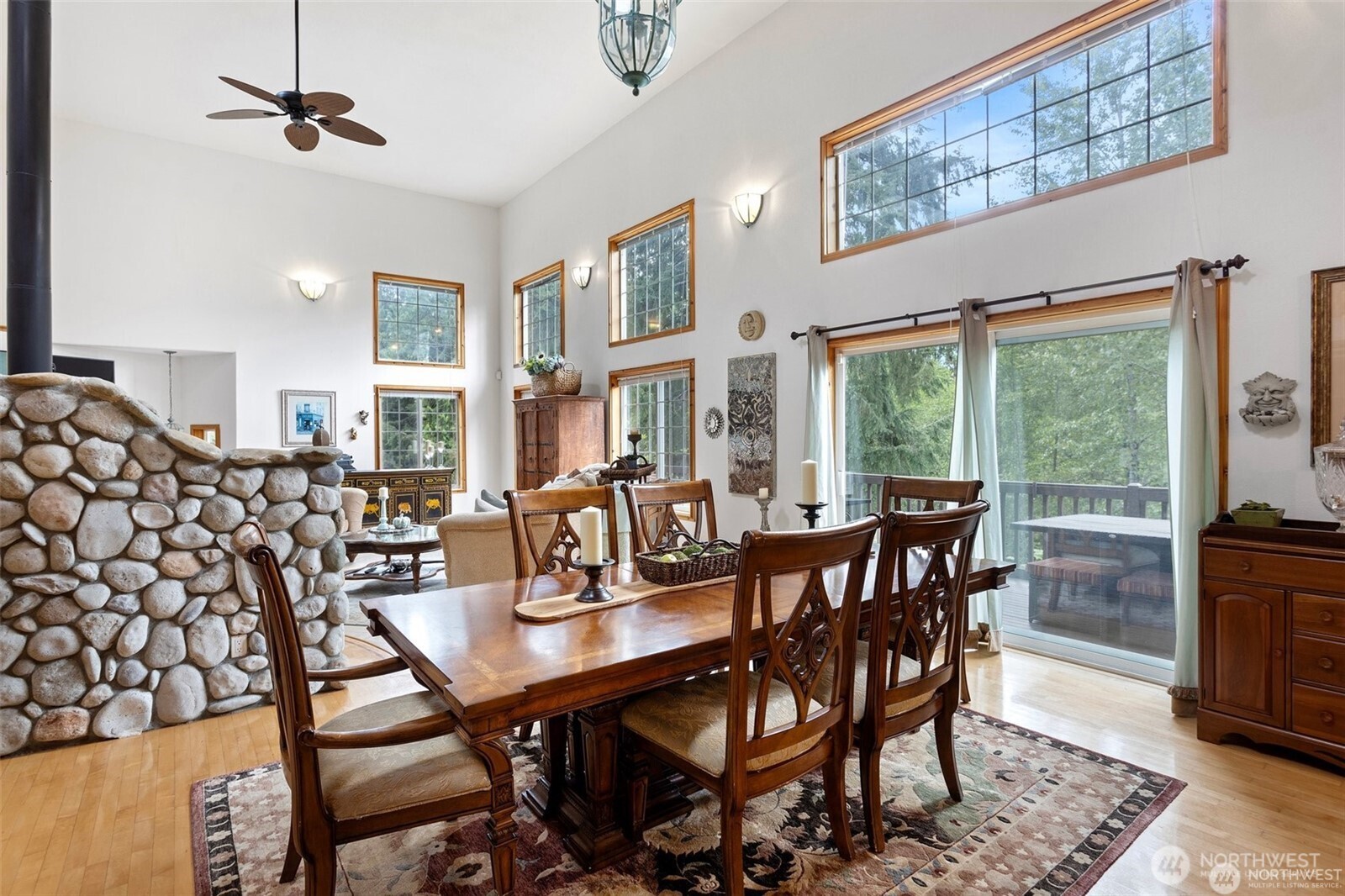 17613 Butler Road Snohomish, WA 98290 - Photo 11 of 40 a view of a dining room with furniture window and wooden floor