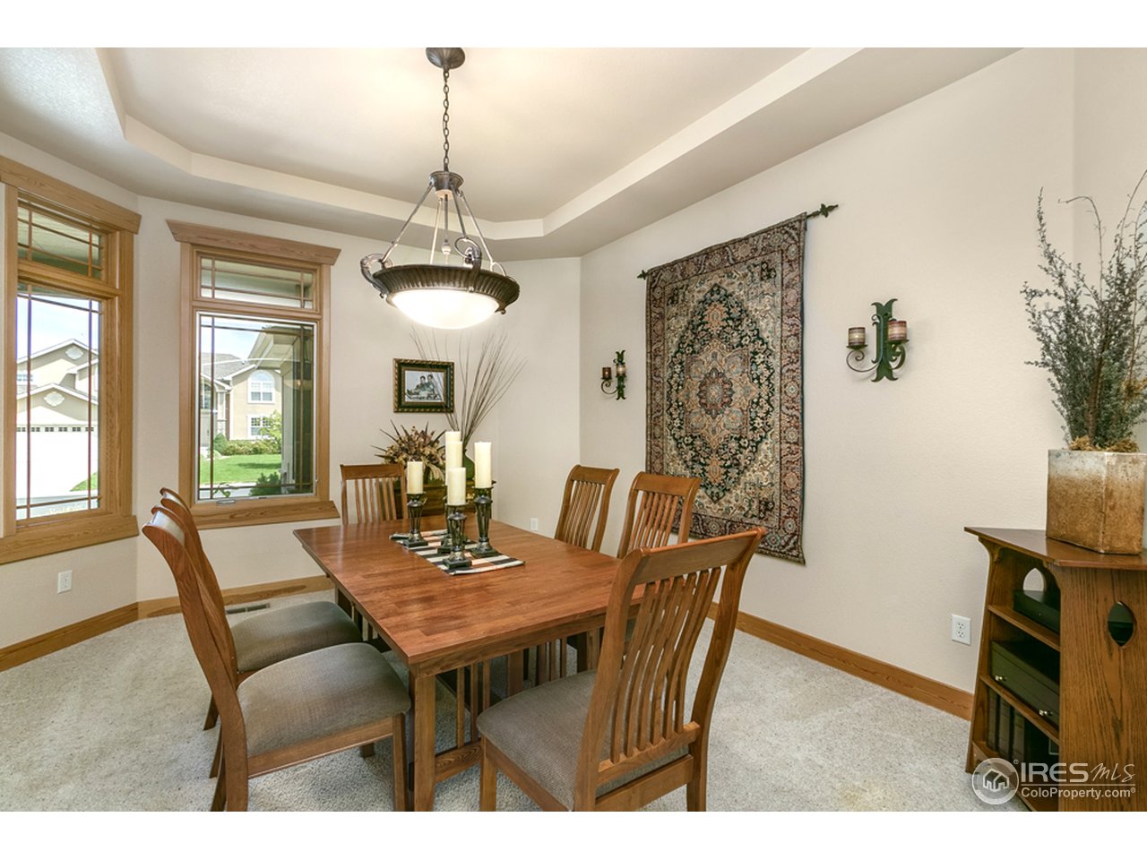 3359 Rookery Road Fort Collins, CO 80528 - Photo 5 of 18 a view of a dining room with furniture window and outside view