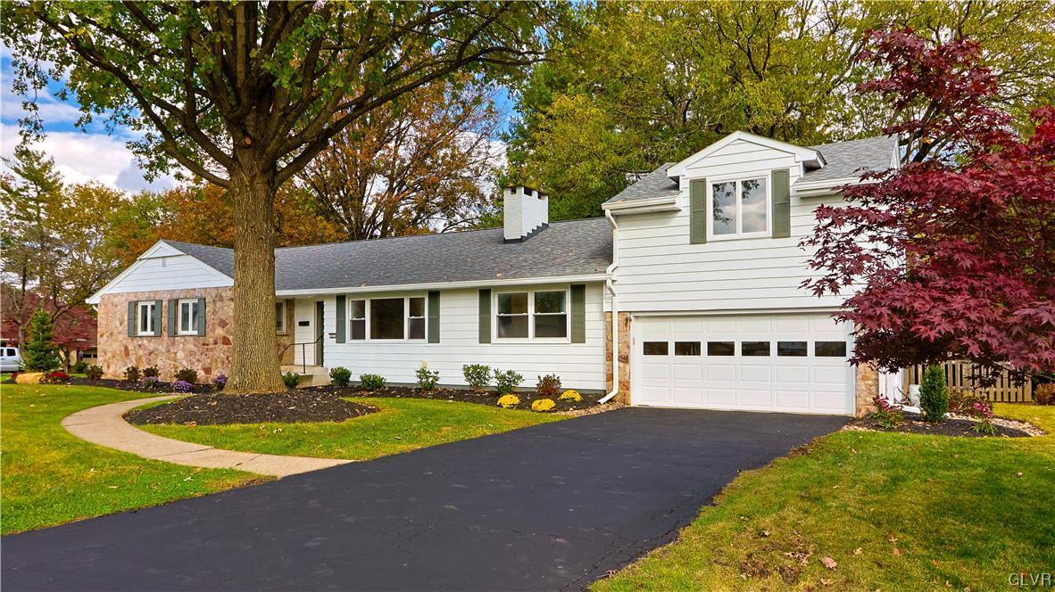 403 Barrett Road Emmaus, PA 18049 - Photo 1 of 44 a front view of a house with garden