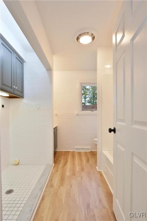 403 Barrett Road Emmaus, PA 18049 - Photo 30 of 44 a bathroom with a bathtub and a shower