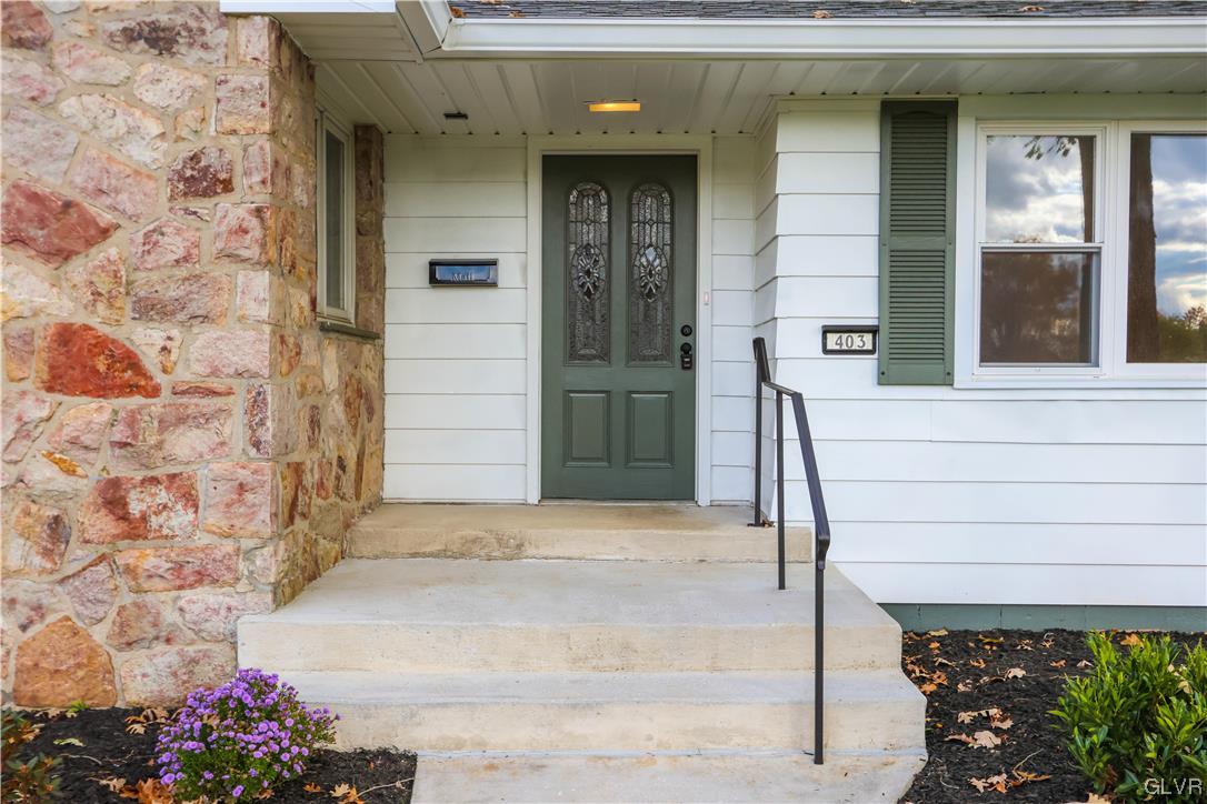 403 Barrett Road Emmaus, PA 18049 - Photo 3 of 44 a front view of a house with a yard