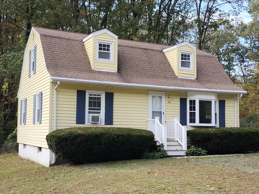 20 Carleton Road Leicester, MA 01542 - Photo 1 of 16 a front view of a house with a yard
