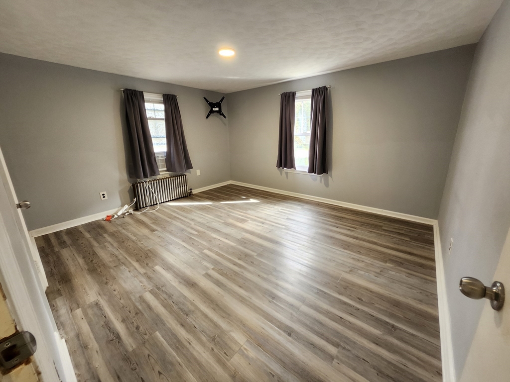 20 Carleton Road Leicester, MA 01542 - Photo 6 of 16 a view of empty room with window