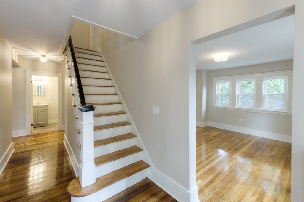 50 Mower Street Worcester, MA 01602 - Photo 17 of 38 a view of entryway with wooden floor and stairs