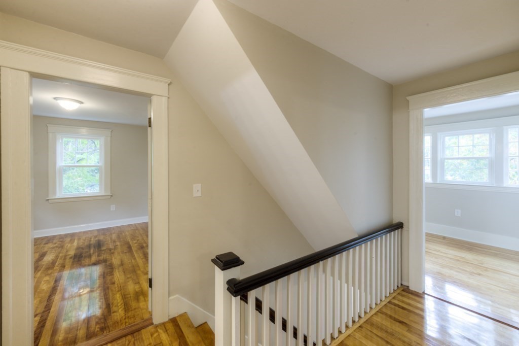 50 Mower Street Worcester, MA 01602 - Photo 19 of 38 a view of a hallway view with wooden floor and staircase