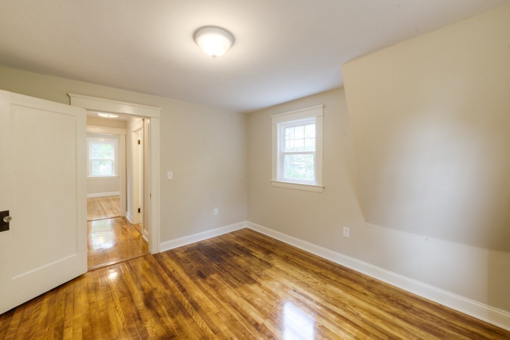 50 Mower Street Worcester, MA 01602 - Photo 26 of 38 a view of empty room with wooden floor and fan