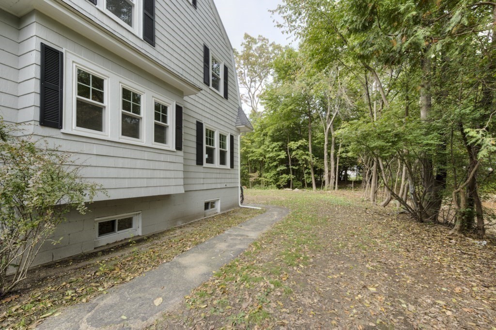 50 Mower Street Worcester, MA 01602 - Photo 32 of 38 a front view of a house with a yard