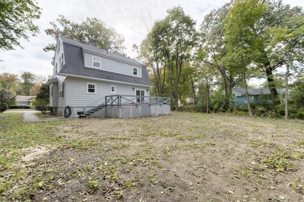 50 Mower Street Worcester, MA 01602 - Photo 35 of 38 a backyard of a house with table and chairs