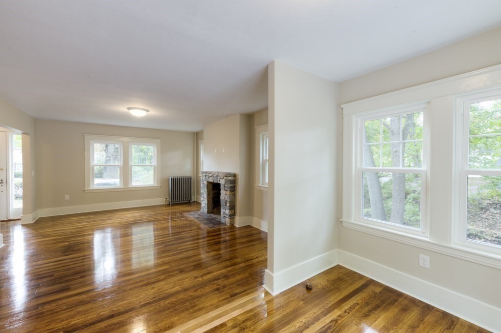 50 Mower Street Worcester, MA 01602 - Photo 6 of 38 a view of empty room with wooden floor and fan