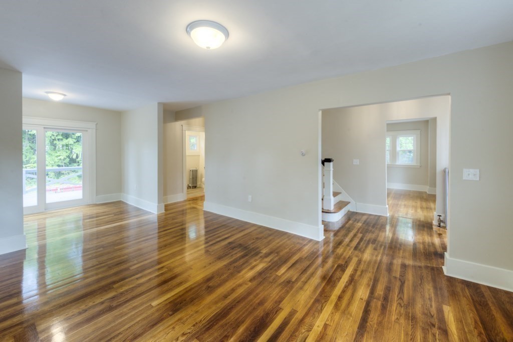 50 Mower Street Worcester, MA 01602 - Photo 10 of 38 wooden floor in an empty room with a window