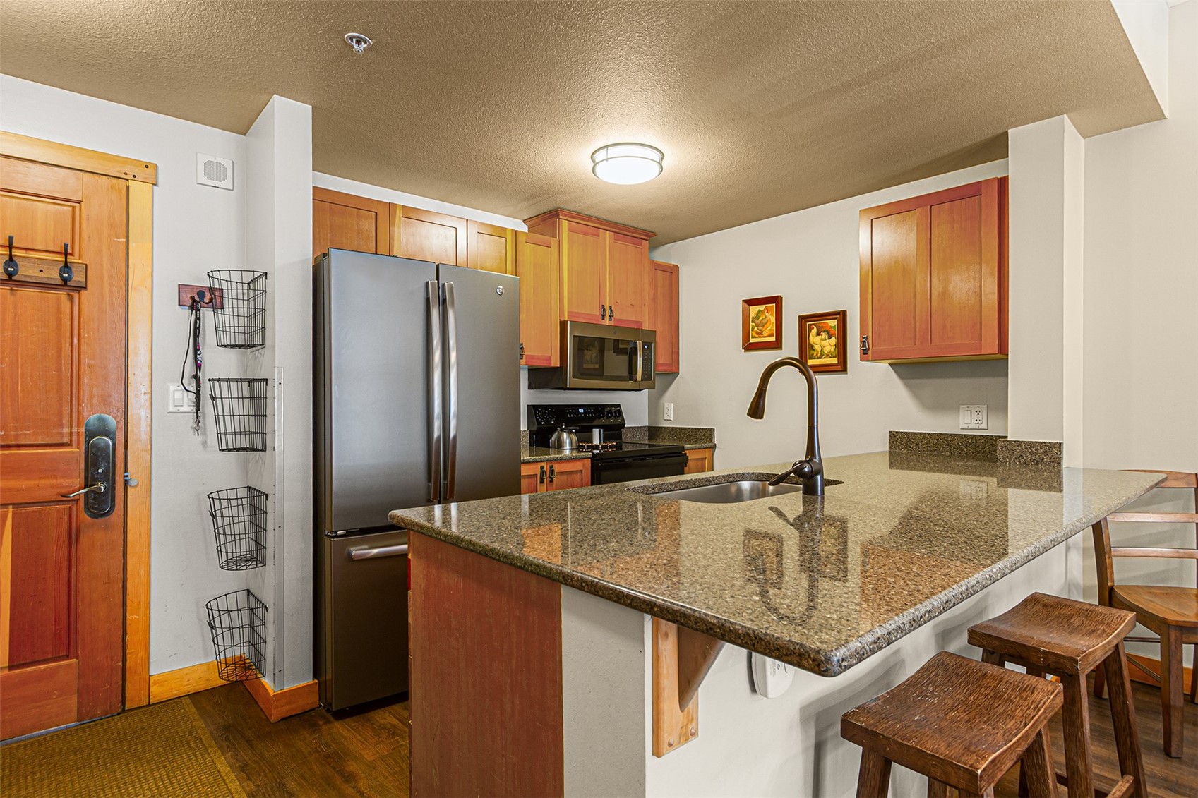 910 Copper Road, Unit 521 Copper Mountain, CO 80443 - Photo 7 of 23 Beautiful kitchen with stainless steel appliances.