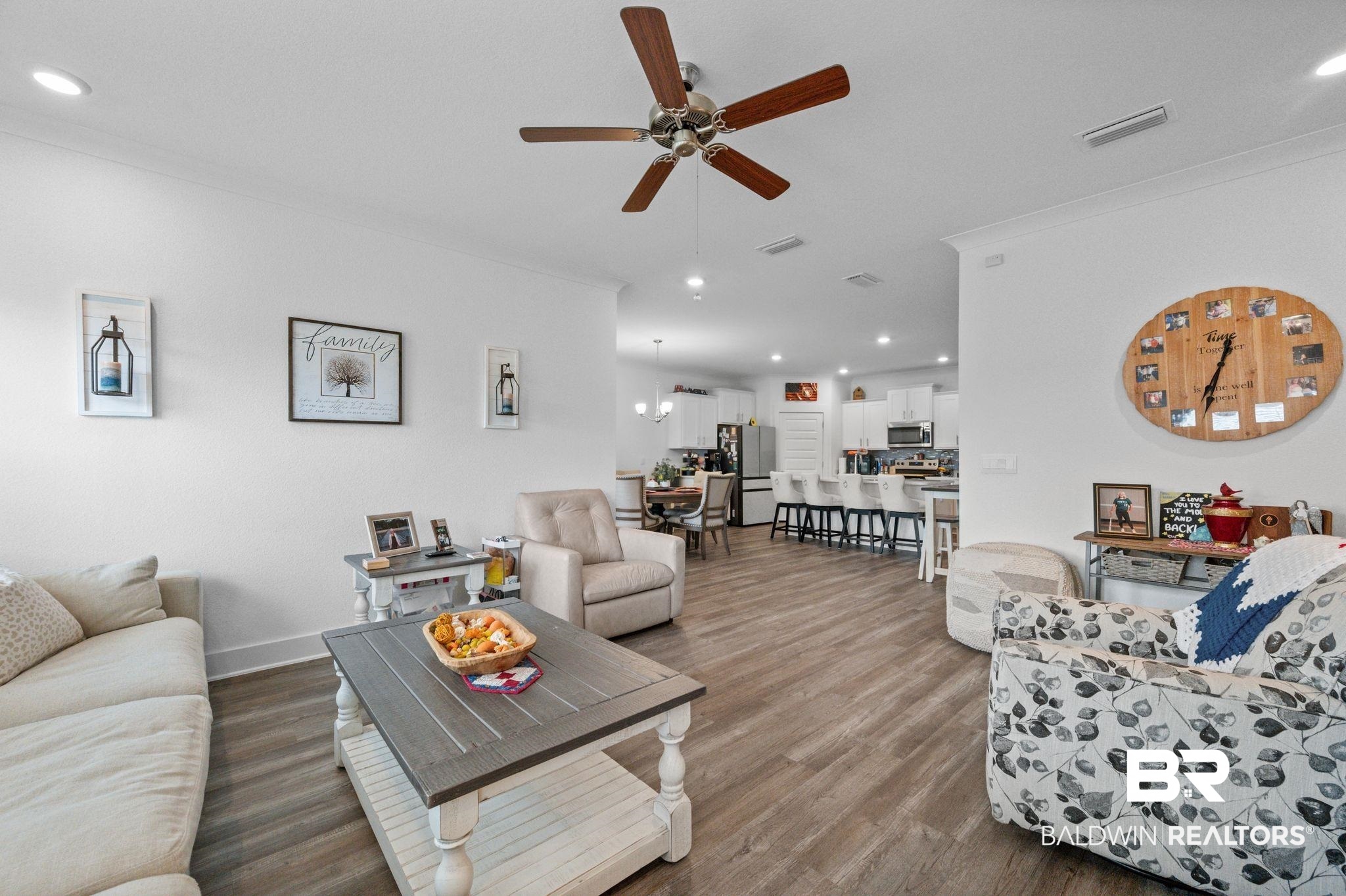 8508 Rosedown Lane Daphne, AL 36526 - Photo 15 of 29 Living room with recessed lighting, wood finished floors, ceiling fan, and crown molding